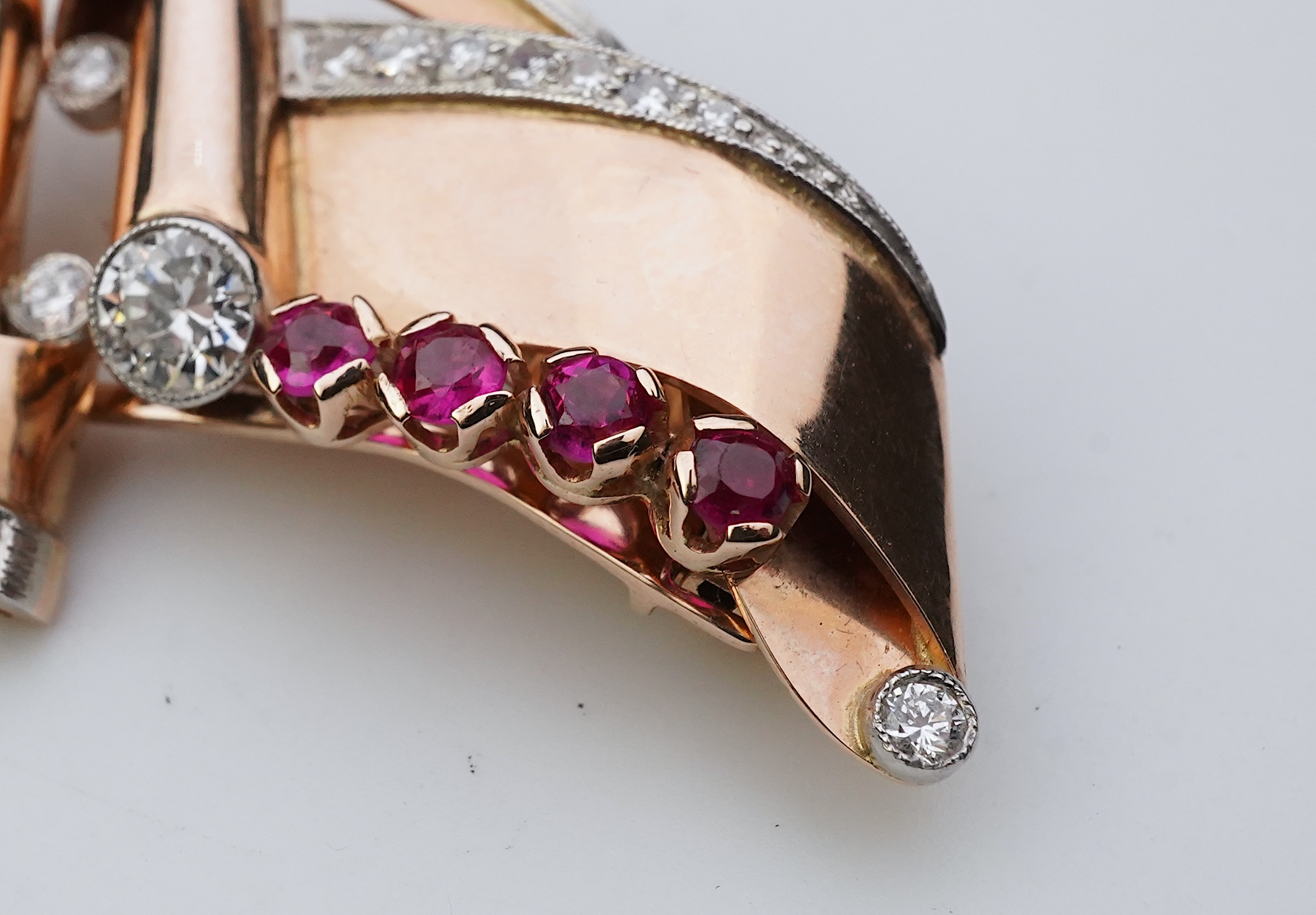 A Retro gold, synthetic ruby and diamond double clip brooch, circa 1940